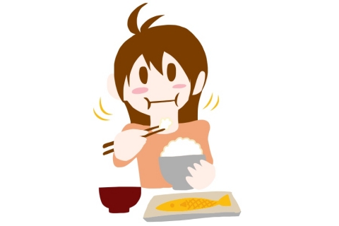 お米をもぐもぐ食べている女性のイラスト
