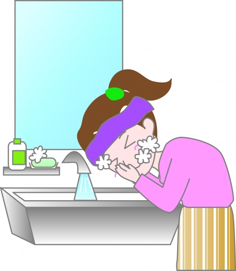 洗顔した泡を流している女性のイラスト