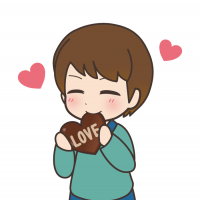 LOVEと書いたチョコを食べている男の子のイラスト