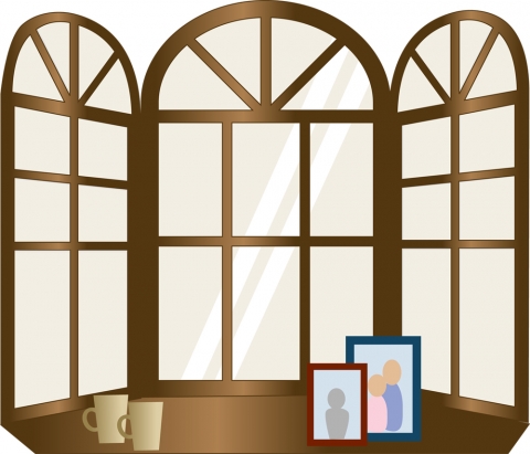 出窓にマグカップと写真が飾られているイラスト