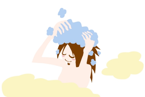シャンプーをたっぷり泡立てて髪を洗ってる女性のイラスト