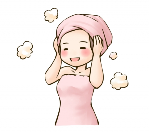 風呂上りに頭にタオルを巻いてニッコリ笑っている女性のイラスト
