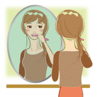 歯を磨いて鏡を見ている女性のイラスト