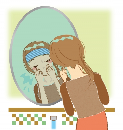 洗顔して顔をすすいでいる女性のイラスト