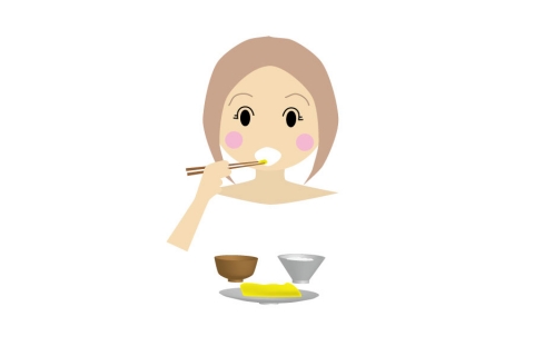 女性が朝食を食べている最中のイラスト