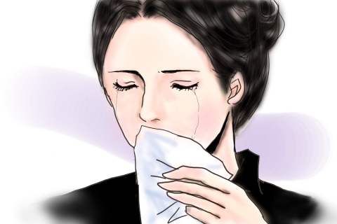 涙を拭う喪服の女性のイラスト