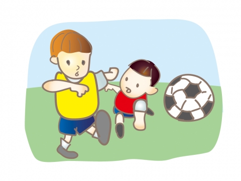 サッカーを楽しむ男の子のイラスト